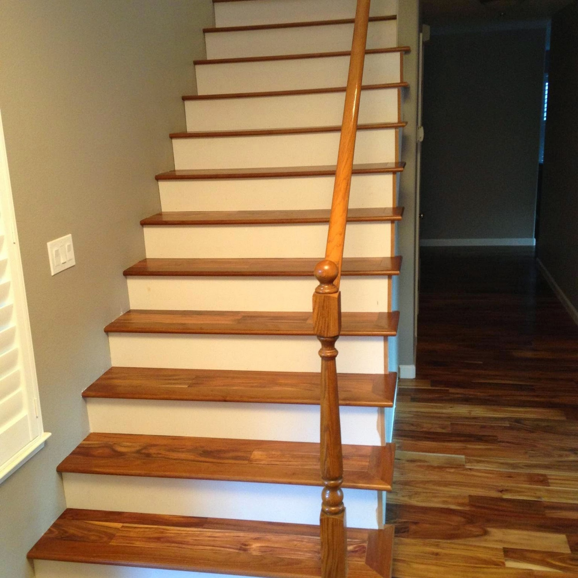 Hardwood staircase and hallway flooring installation by Sulca’s Carpets, Elk Grove